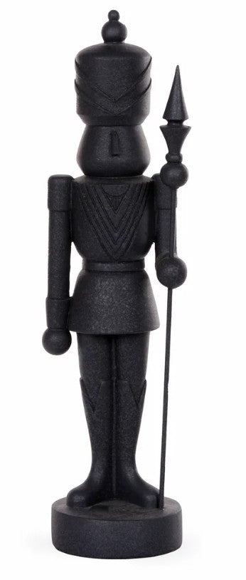 Matte black resin nutcracker-inspired Christmas soldier holding a ceremonial staff, perfect for modern festive displays