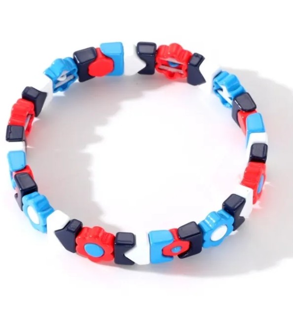 Colourful stretch bracelet featuring blue, red, white and navy geometric beads for everyday wear and stacking.