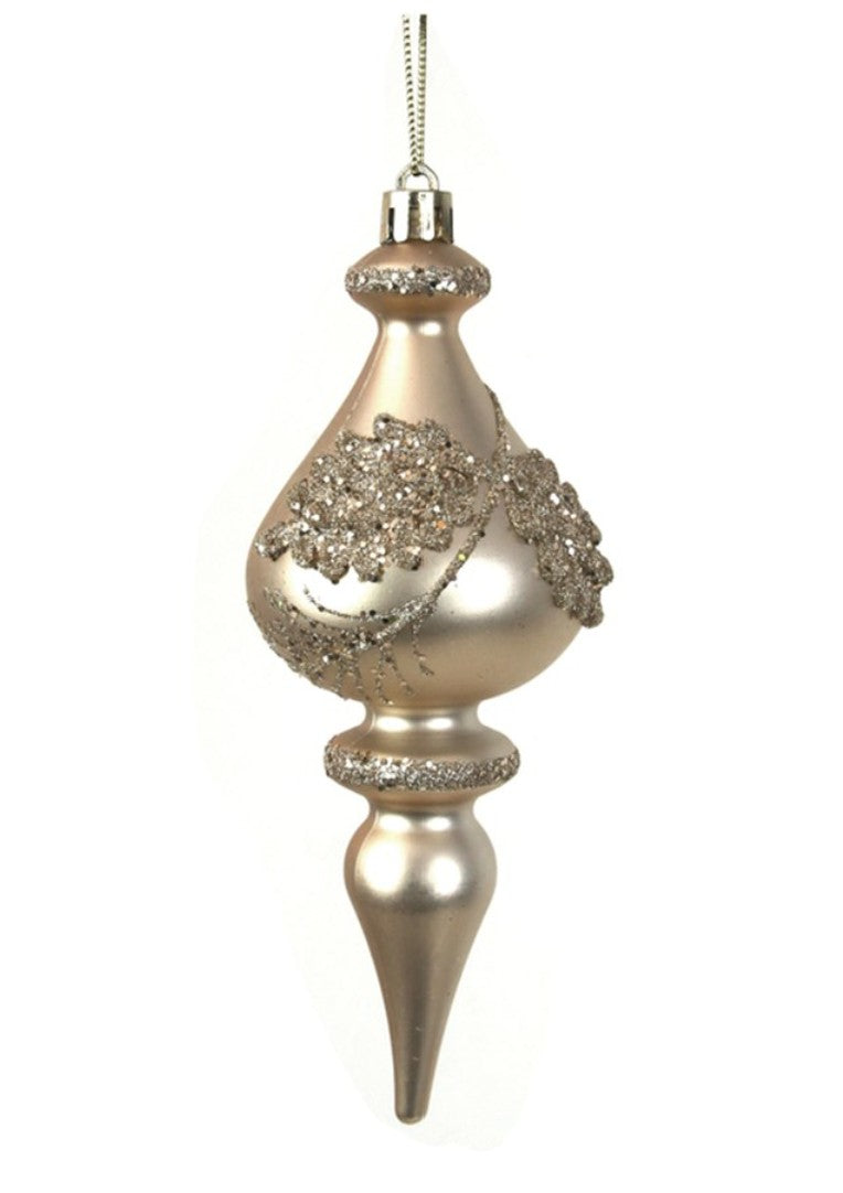A metallic champagne-gold Christmas tree ornament with silver glittery decorative accents and a silver hanging loop, shown against a plain white background.