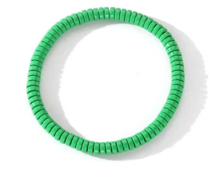Emerald green heishi bead stretch stacker bracelet for everyday wear and layering.