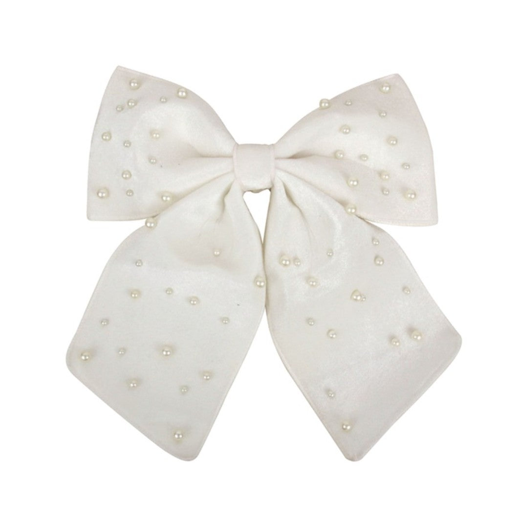 An off-white satin bow decorated with small, scattered pearl-like beads, shown against a plain white background.