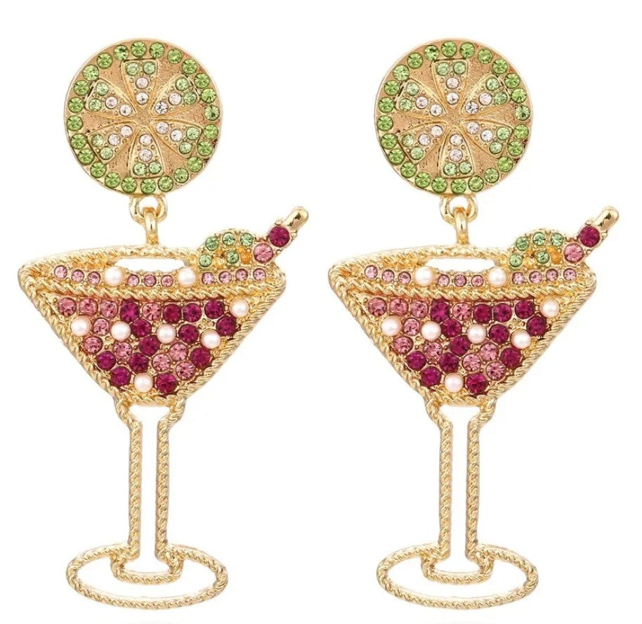 Gold statement martini glass drop earrings featuring pink crystals, pearl accents and a sparkling green lime slice stud.