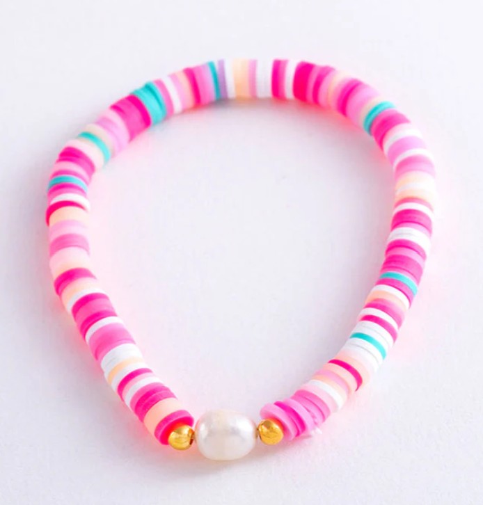 Pink, blush, white and aqua heishi bead stretch bracelet featuring a freshwater pearl centrepiece with gold accent beads.
