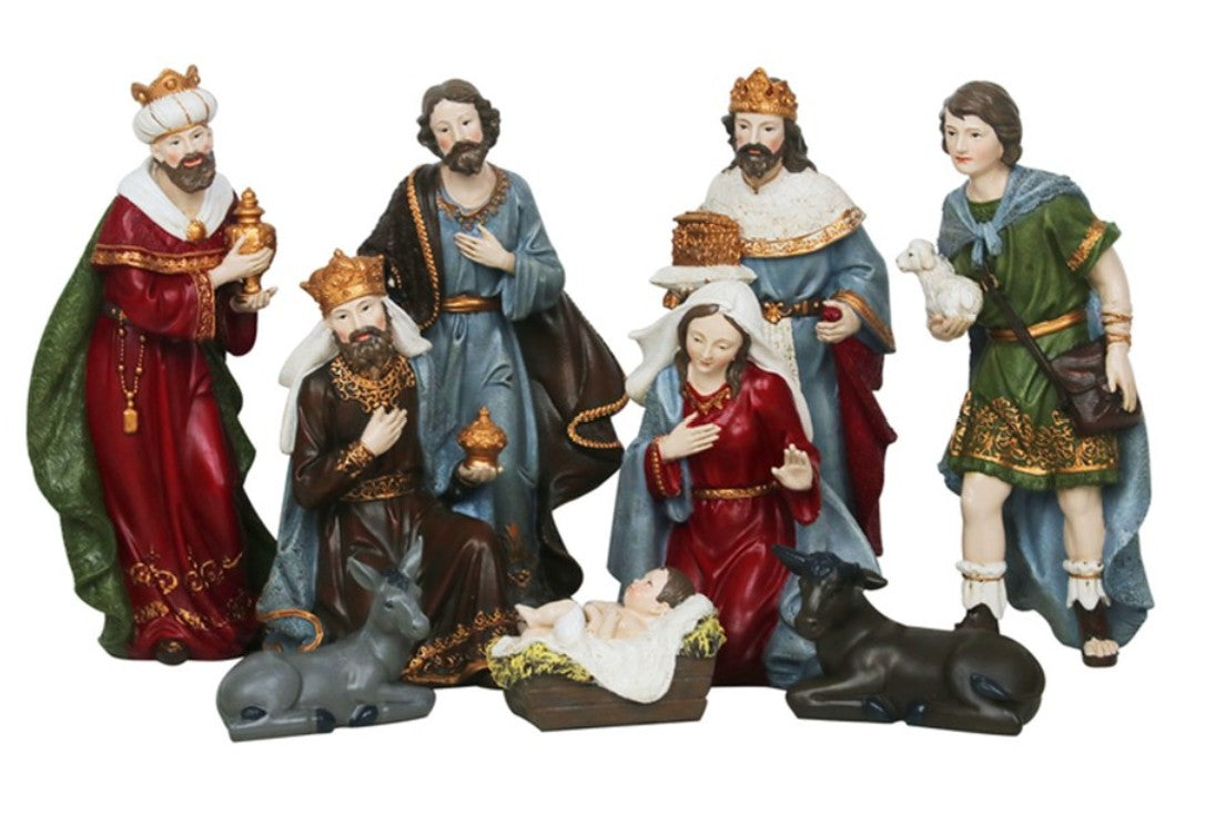 A multi-piece Christmas nativity set figurine depicting the Holy Family, Three Wise Men, and Shepherds, with animals and a baby in a manger, shown against a plain white background.