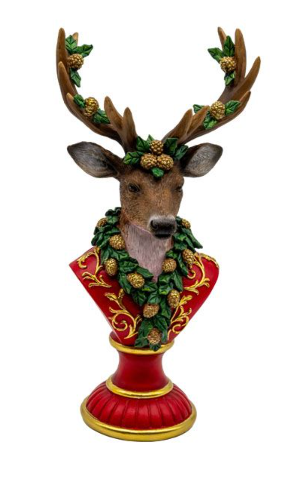 Decorative deer head figure with antlers and wreath on a red pedestal against a white background
