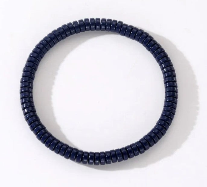 Classic navy heishi bead stretch stacker bracelet for everyday wear and layering.